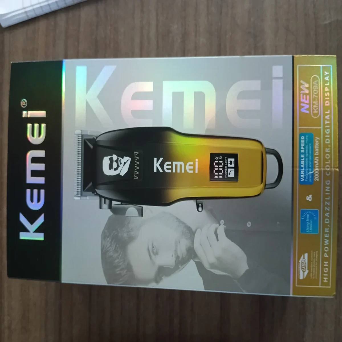 Kemei Pro Electric Hair Clipper Km-709a Adjustable Cutter Head Professional Cordless Rechargeable Hair Cutter